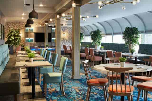 Modern event space at Leo's Restaurant, Edinburgh: flexible seating for networking and dinners.