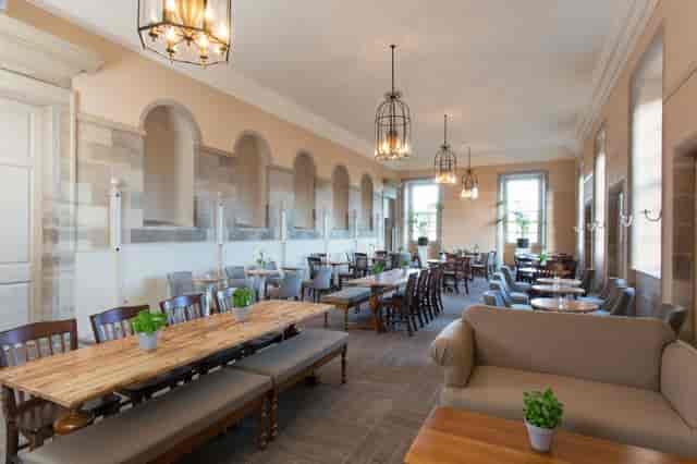 Adam Stables at Hopetoun House: rustic-chic event venue with lounge seating for networking events.