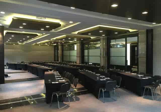 Glasgow Suite conference room in classroom style setup for corporate training and presentations.