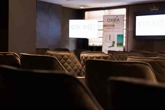 Executive boardroom setup with textured seating at Edith's, Royale Paris for corporate meetings.