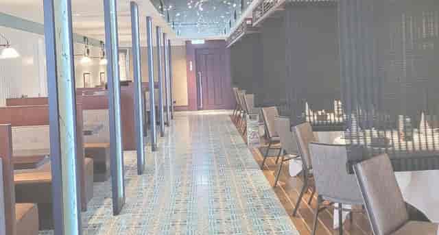 Modern Nanhai No. 2 restaurant with booth seating for corporate events and private dining.