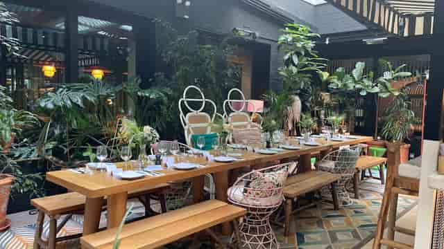 Garden Bar at Mama Shelter London: elegant dining setup for intimate gatherings and corporate retreats.