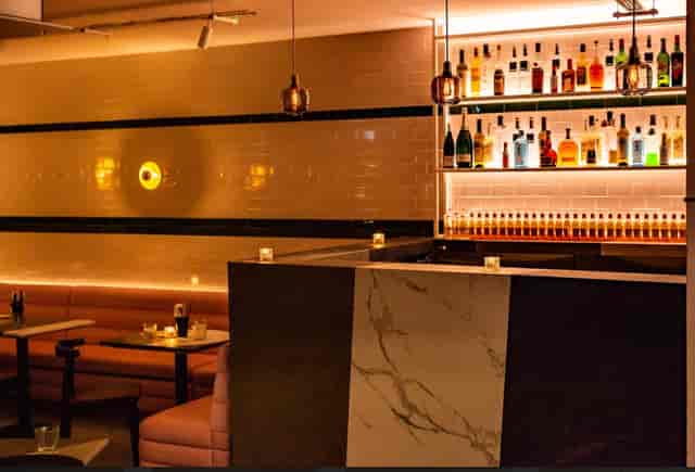 Modern bar at The Lounge & Kebab Queen, ideal for events and cocktail receptions.