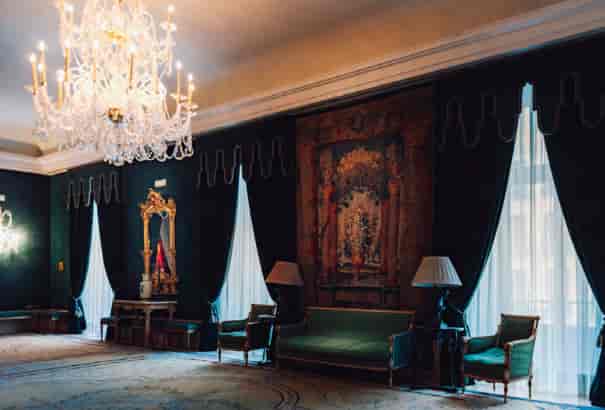 Elegant event space with chandeliers for upscale meetings and intimate gatherings.