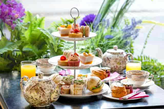 Brigit's Bakery afternoon tea on London bus for luxury networking and corporate events.