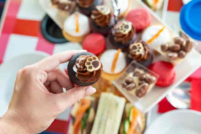 Brigit’s Afternoon Tea Bus bite-sized branded desserts for corporate event catering.