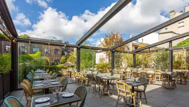 Retractable roof terrace at MOB Hotel SR1, ideal for alfresco corporate networking and events.