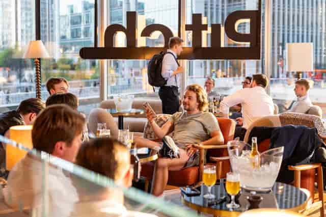 Pitch Wharf networking lounge: cozy seating for professional corporate events and business mixers.
