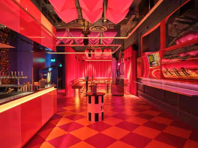 "Vibrant Fun House event space in FAIRGAME with bold colors for cocktail receptions."
