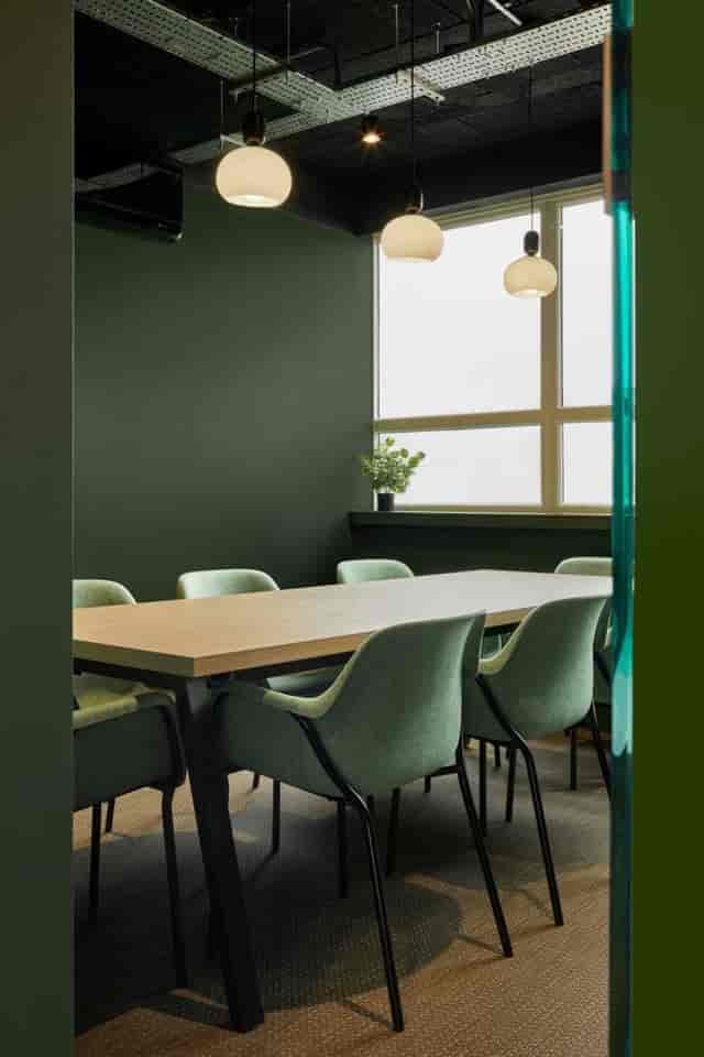 Modern boardroom meeting room for corporate strategy sessions and client presentations.