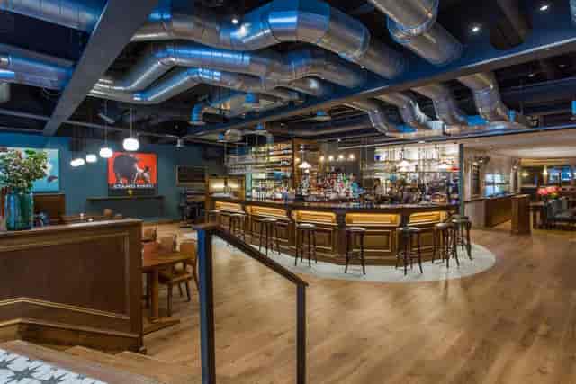 Maison Close Mayfair private hire area: industrial networking venue and event bar.