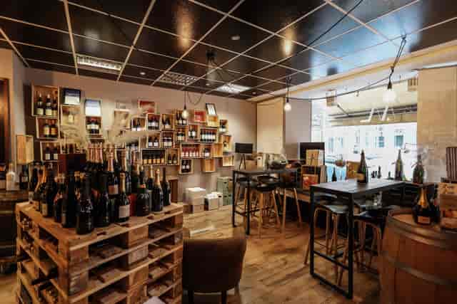Rustic-chic wine bar interior at Heinzhermann, perfect for wine tastings and corporate receptions.