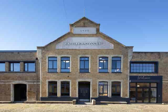Industrial-chic event venue with brick facade for creative summits and offsites.