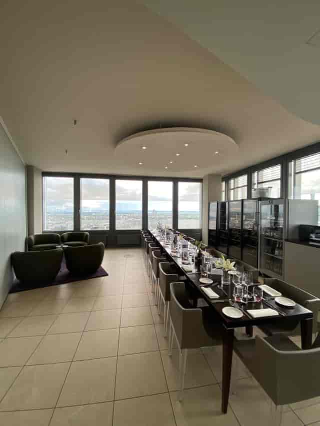 Elegant meeting space with panoramic windows for executive meetings and exclusive events.