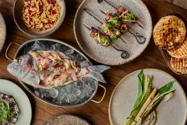 Gourmet spread at Pyro Restaurant, ideal for corporate events and fine dining.