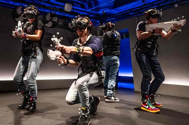 Team building at Sandbox VR London: immersive motion-capture technology for corporate events.