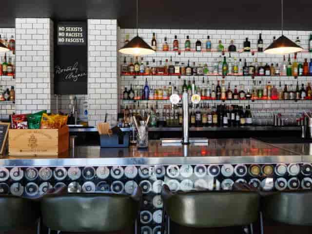 Modern Cafe Bar at The Arzner for corporate networking receptions and professional mixers.