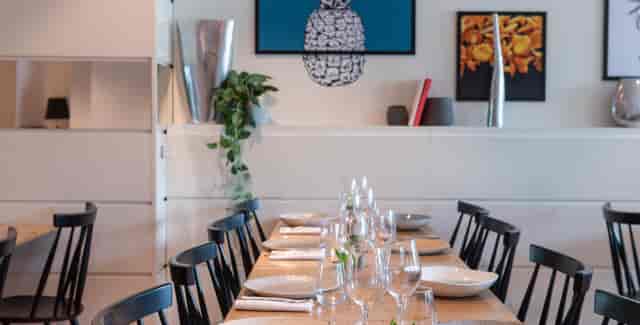 Le Dix Restaurant: Elegant table setup for corporate board dinners and networking events.