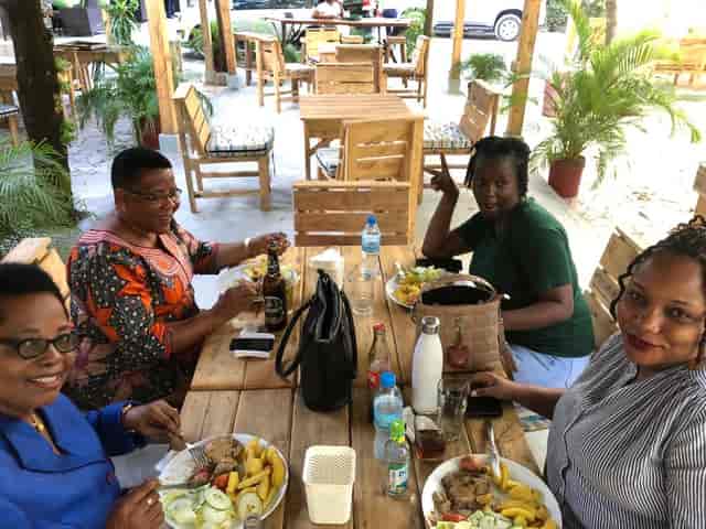Rustic communal seating at Shekinah Garden bar and grill for networking lunch events.