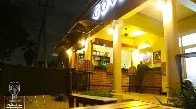 Outdoor sports bar with warm lighting for networking events and social gatherings.