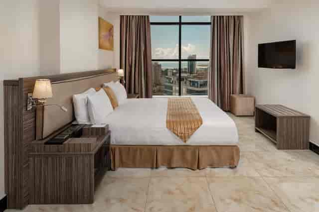 Tarangire Room at Golden Tulip Dar: upscale corporate hotel room for VIP business conferences.