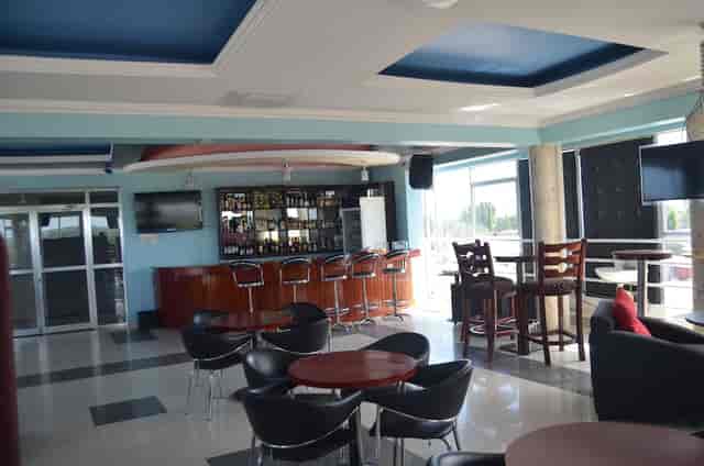 Outdoor hotel bar with modular seating for networking events and cocktail receptions.