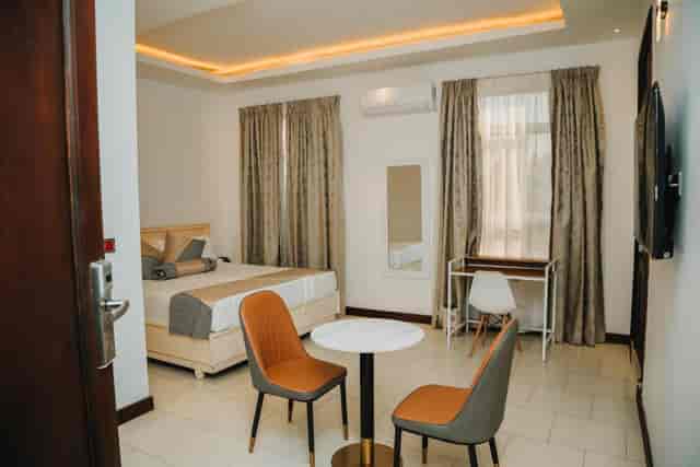 Hotel Amaranth conference room with workstation, ideal for business meetings and remote work.