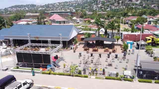 Outdoor event venue at The Cask Bar & Grill with stage for corporate parties and social gatherings.