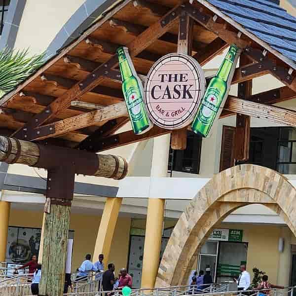 Rustic outdoor dining area at The Cask Bar & Grill for casual team-building and conference mixers.