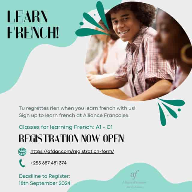 Engaged audience in Alliance Française language workshop classroom.