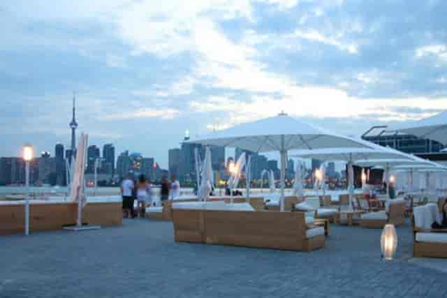 Lounge at Cabana Toronto rooftop venue with city skyline view for corporate networking events.