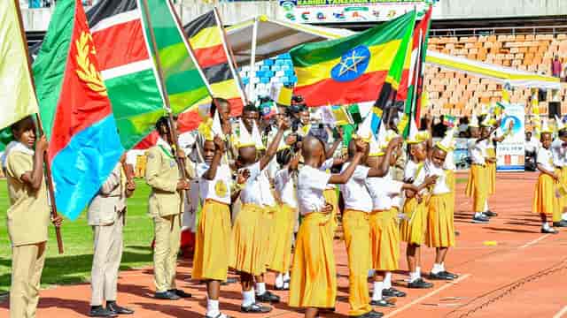 Amecea Opening Ceremony processional at Msimbazi Centre, featuring youth event staging.