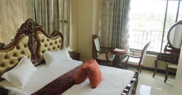 Rungwe Hotel conference hall, traditional interior, corporate event venue, professional meeting space.