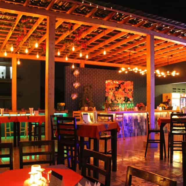 Tips Lounge rooftop bar with bistro seating, perfect for networking events and cocktail receptions.