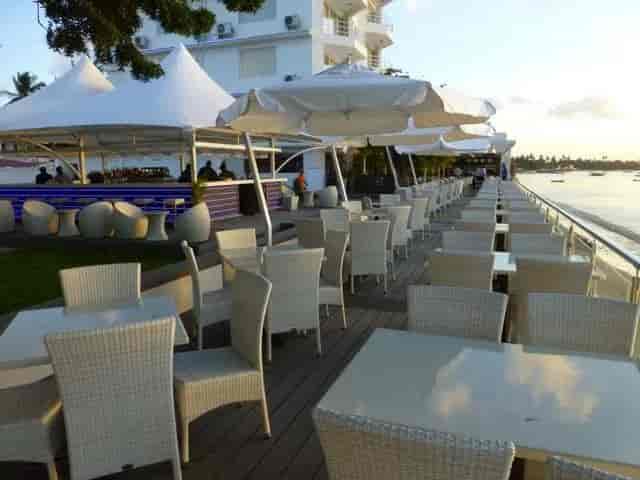 Open-air lounge with scenic sunset views, ideal for cocktail reception and corporate event venue.