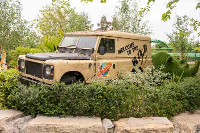 Vintage truck in lush outdoor setting at Chessington World of Adventures event space.