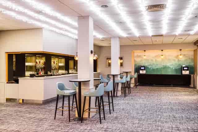 Heart of Kent Suite with built-in bar, ideal for networking events and corporate cocktail receptions.
