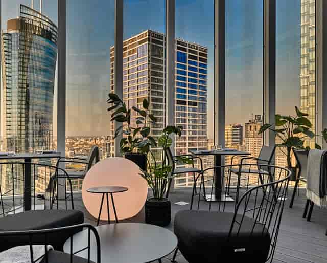 Roof Skybar restaurant with panoramic city skyline views, perfect for luxury events and gala dinners.