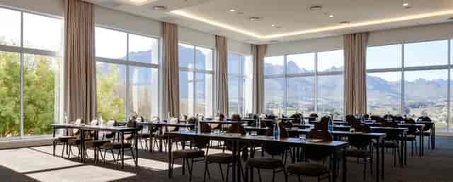 Magnifica Suite meeting space with mountain views for corporate workshops and executive conferences.