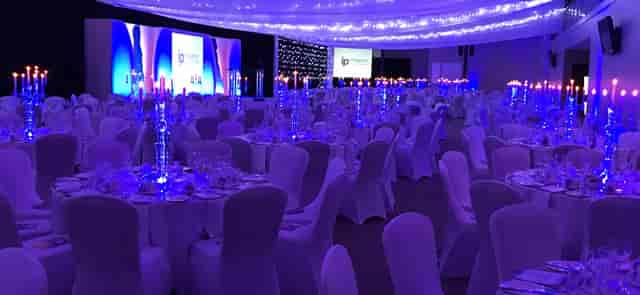 Gala dinner setup with LED lighting at DoubleTree Milton Keynes for corporate events and galas.