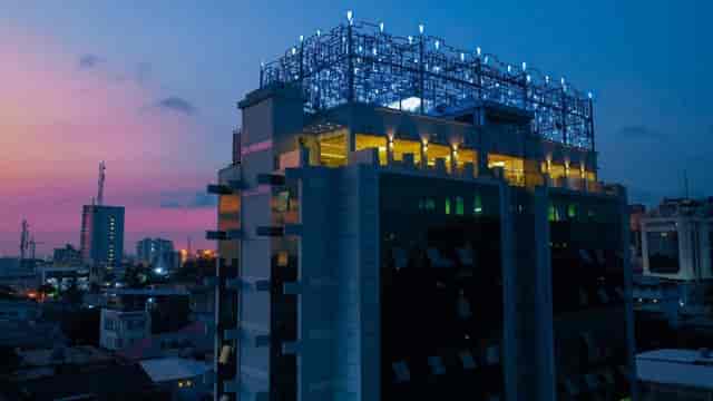 Vertigo Hotel rooftop at dusk: elegant cocktail reception and networking event venue.