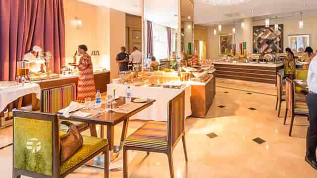 Antonello Meeting Room breakfast buffet with live cooking station for conference catering.