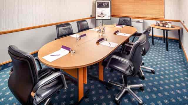 Boardroom meeting space at Mercure Livingston Hotel for corporate events and professional workshops.