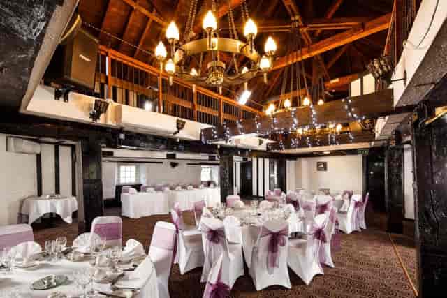 Kinnoull Suite with timber beams for elegant weddings and formal dinner events.