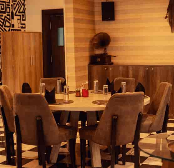 Private dining at Noir Lagos: elegant circular table setup for high-end events and board meetings.
