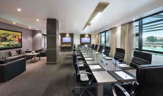 Executive boardroom at Legend Hotel Lagos Airport for formal meetings and corporate networking.