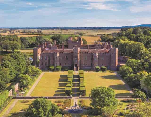 Herstmonceux Castle courtyard: a grand venue for luxury incentive travel and estate weddings.