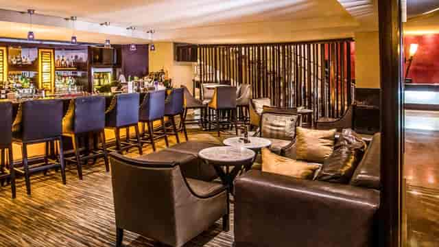 Sophisticated hotel lounge with bar seating for corporate networking and business events in Lagos.