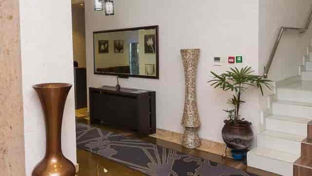 Golden Tulip Oniru meeting room pre-function area for corporate event registration and conferences.