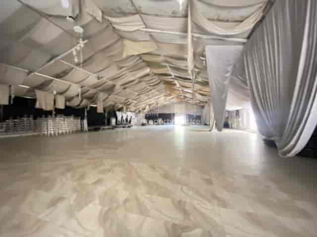 QueensPark Events Centre marquee venue with tiered seating for weddings and corporate events.